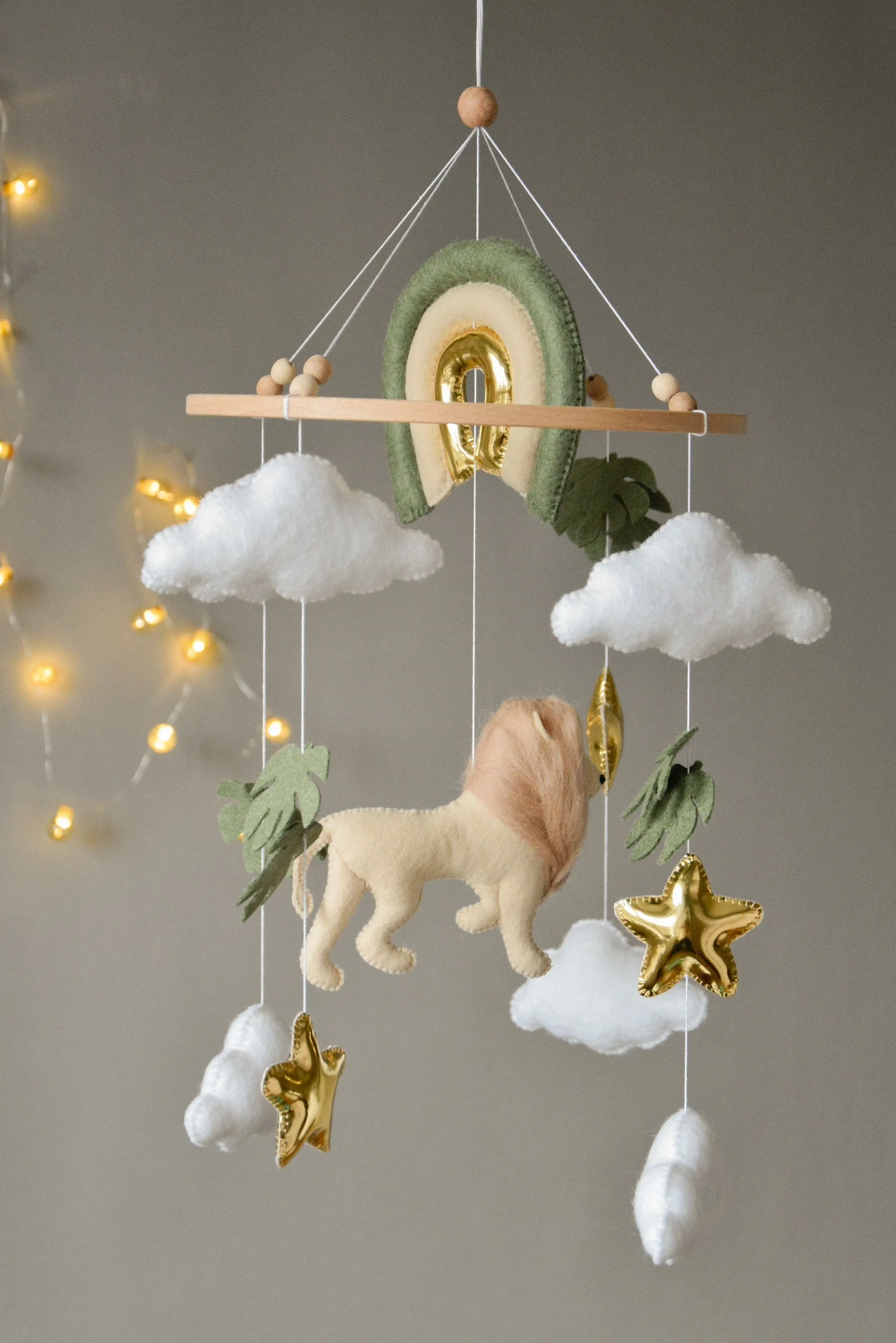 Baby mobile with Lion, golden stars clouds, monstera leaves and rainbow